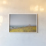 Rocky Coast Days by Nathan Larson. shown as a paper print in a white frame. Available as a archival giclee rolled canvas, fine art paper, or poster print. SKU 90175i.