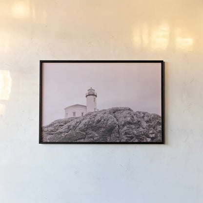 Rocky Lighthouse by Nathan Larson. shown as a paper print in a black flame. Available as a archival giclee rolled canvas, fine art paper, or poster print. SKU 91851i.