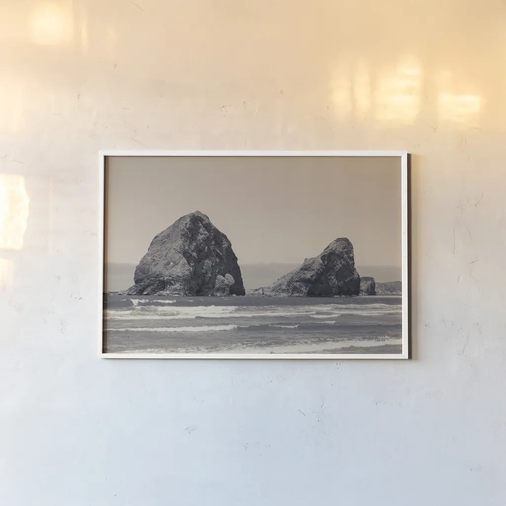 Rocky Shores by Nathan Larson. shown as a paper print in a white frame. Available as a archival giclee rolled canvas, fine art paper, or poster print. SKU 92598i.