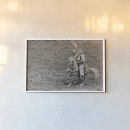 Rodeo I Sepia by Nathan Larson. shown as a paper print in a white frame. Available as a archival giclee rolled canvas, fine art paper, or poster print. SKU 82723i.