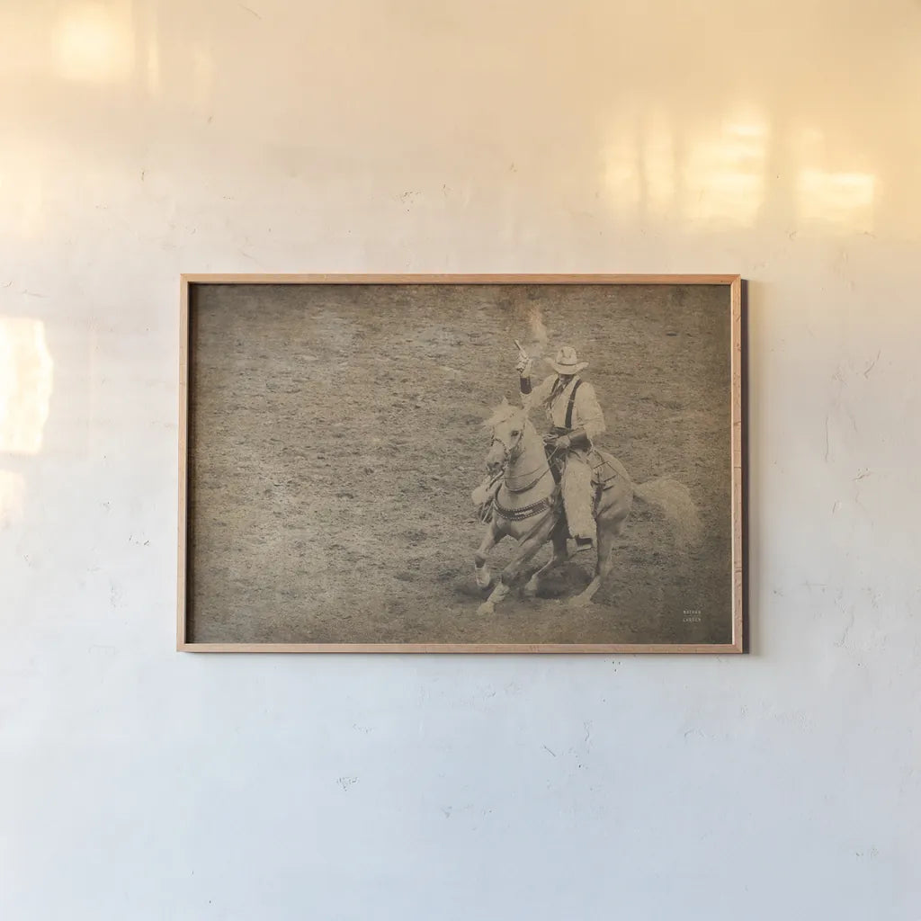 Rodeo I Sepia Vintage by Nathan Larson. shown as a paper print in a natural frame. Available as a archival giclee rolled canvas, fine art paper, or poster print. SKU 91324i.