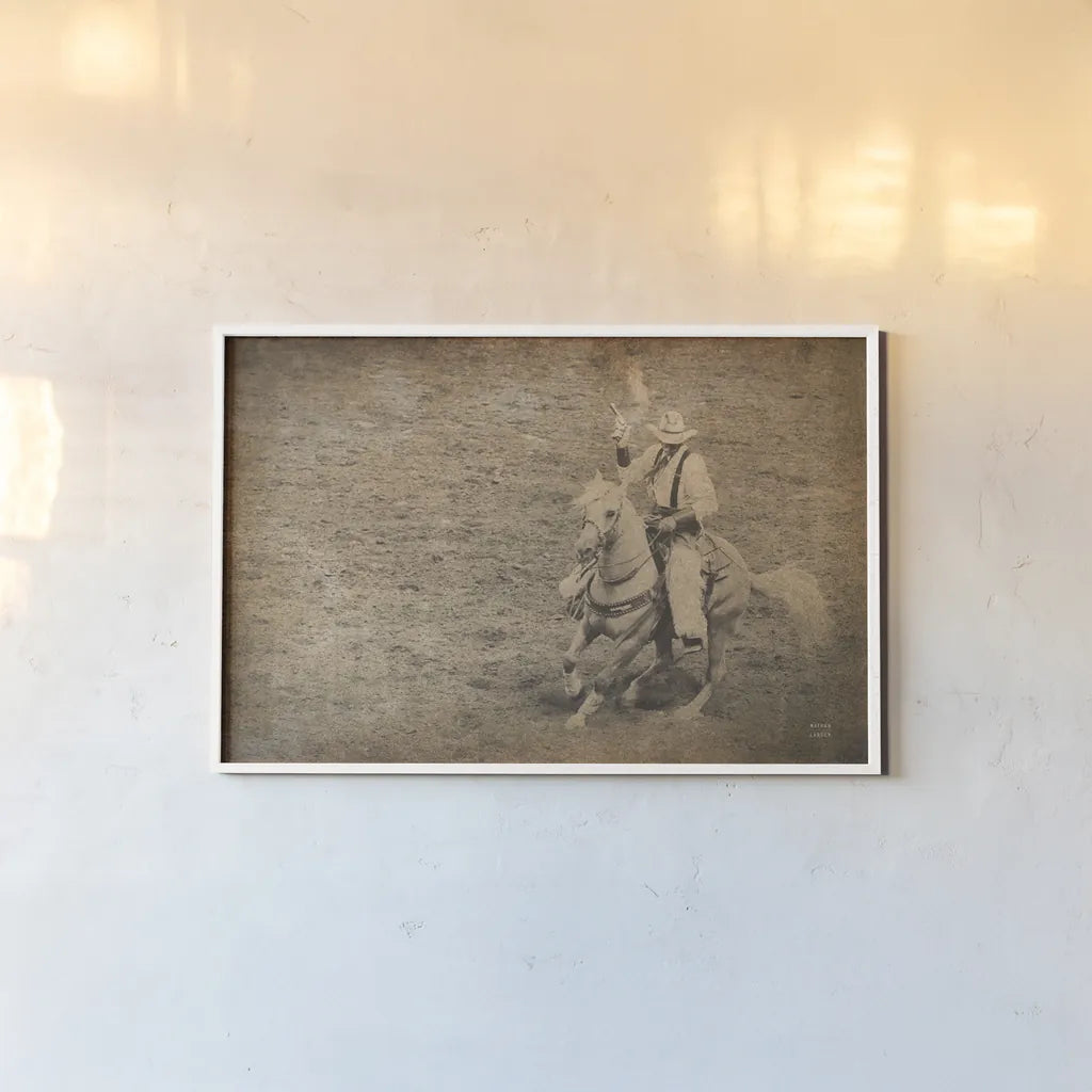 Rodeo I Sepia Vintage by Nathan Larson. shown as a paper print in a white frame. Available as a archival giclee rolled canvas, fine art paper, or poster print. SKU 91324i.