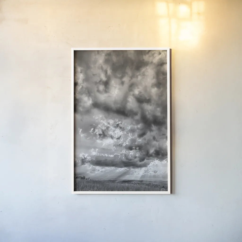 Rolling Pasture Rays by Nathan Larson. shown as a paper print in a white frame. Available as a archival giclee rolled canvas, fine art paper, or poster print. SKU 71166h.