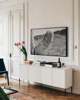 Saguaro by Nathan Larson. shown as a framed stretched canvas in a living room above a console. Available as a archival giclee rolled canvas, fine art paper, or poster print. SKU 72034i.