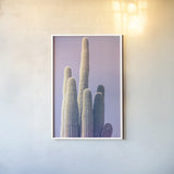 Saguaro Purple Pastel by Nathan Larson. shown as a paper print in a white frame. Available as a archival giclee rolled canvas, fine art paper, or poster print. SKU 97578h.