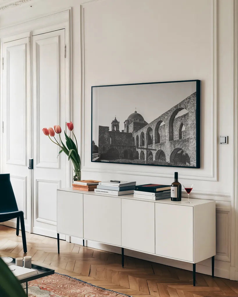 San Antonio Mission I by Nathan Larson. shown as a framed stretched canvas in a living room above a console. Available as a archival giclee rolled canvas, fine art paper, or poster print. SKU 102780i.