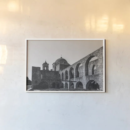 San Antonio Mission I by Nathan Larson. shown as a paper print in a white frame. Available as a archival giclee rolled canvas, fine art paper, or poster print. SKU 102780i.