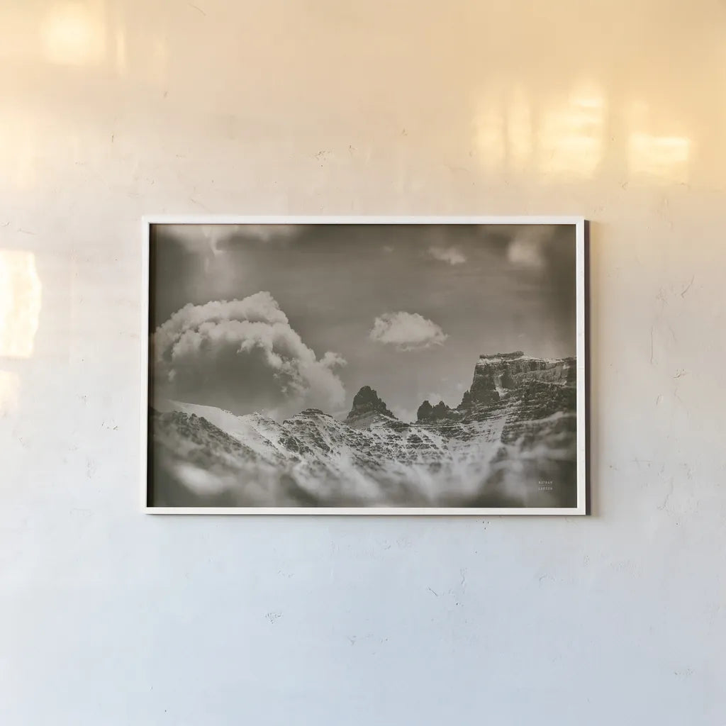 Sepia Peaks by Nathan Larson. shown as a paper print in a white frame. Available as a archival giclee rolled canvas, fine art paper, or poster print. SKU 81191i.