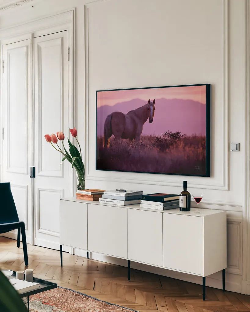 Sharing a Sunset by Nathan Larson. shown as a framed stretched canvas in a living room above a console. Available as a archival giclee rolled canvas, fine art paper, or poster print. SKU 94127i.