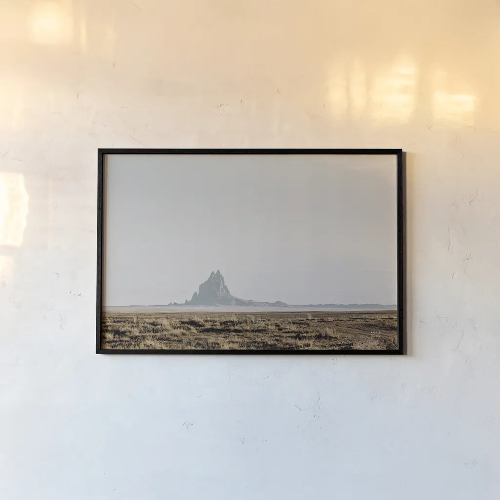 Shiprock Fade by Nathan Larson. shown as a paper print in a black flame. Available as a archival giclee rolled canvas, fine art paper, or poster print. SKU 95336i.