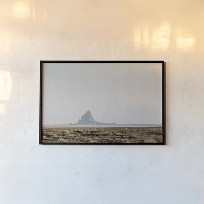 Shiprock Fade by Nathan Larson. shown as a paper print in a black flame. Available as a archival giclee rolled canvas, fine art paper, or poster print. SKU 95336i.