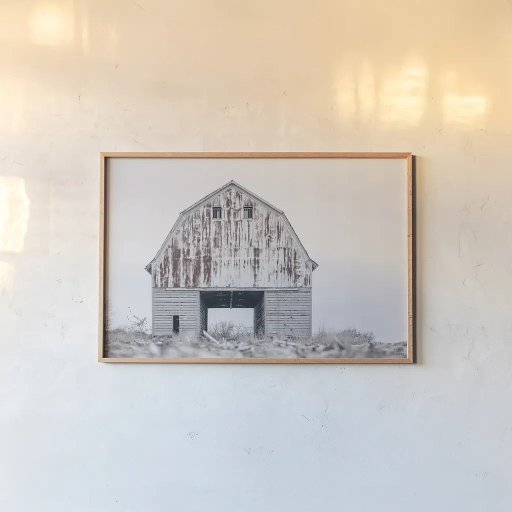 Sitting Still by Nathan Larson. shown as a paper print in a natural frame. Available as a archival giclee rolled canvas, fine art paper, or poster print. SKU 98508i.