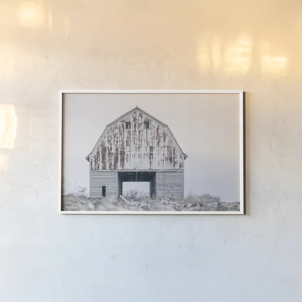 Sitting Still by Nathan Larson. shown as a paper print in a white frame. Available as a archival giclee rolled canvas, fine art paper, or poster print. SKU 98508i.