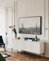 Sonoran Wonderland by Nathan Larson. shown as a framed stretched canvas in a living room above a console. Available as a archival giclee rolled canvas, fine art paper, or poster print. SKU 90439i.