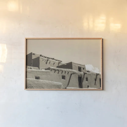 Southwest Adobe by Nathan Larson. shown as a paper print in a natural frame. Available as a archival giclee rolled canvas, fine art paper, or poster print. SKU 77274i.