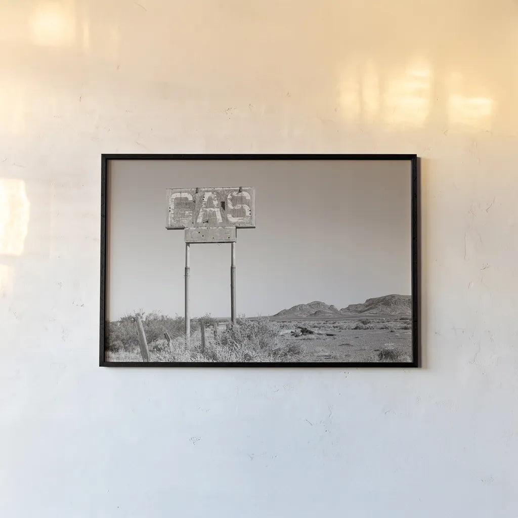 Southwest Gas Station by Nathan Larson. shown as a paper print in a black flame. Available as a archival giclee rolled canvas, fine art paper, or poster print. SKU 83391i.