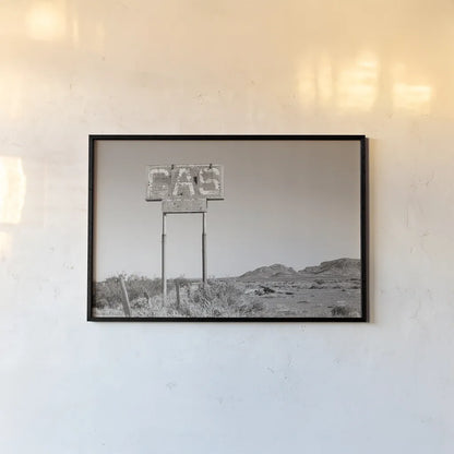 Southwest Gas Station by Nathan Larson. shown as a paper print in a black flame. Available as a archival giclee rolled canvas, fine art paper, or poster print. SKU 83391i.