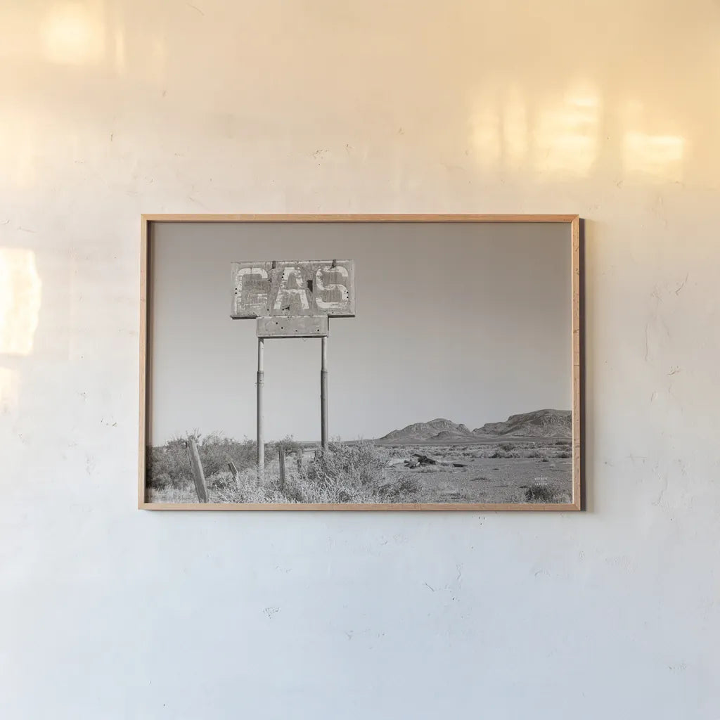 Southwest Gas Station by Nathan Larson. shown as a paper print in a natural frame. Available as a archival giclee rolled canvas, fine art paper, or poster print. SKU 83391i.