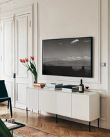 Southwest Layers BW by Nathan Larson. shown as a framed stretched canvas in a living room above a console. Available as a archival giclee rolled canvas, fine art paper, or poster print. SKU 83980i.