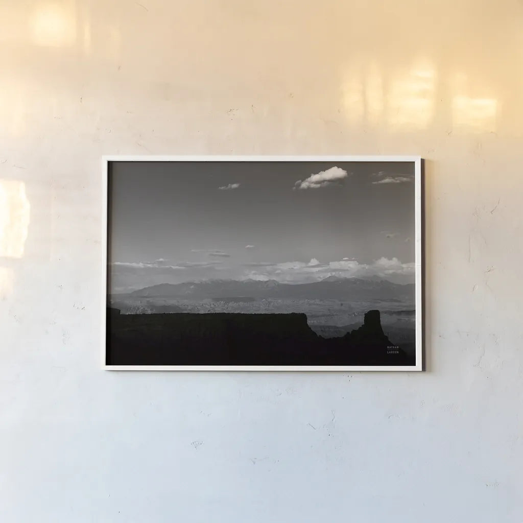 Southwest Layers BW by Nathan Larson. shown as a paper print in a white frame. Available as a archival giclee rolled canvas, fine art paper, or poster print. SKU 83980i.