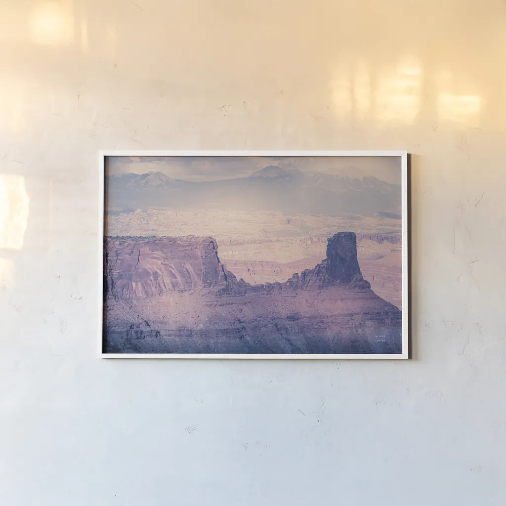 Southwest Sun by Nathan Larson. shown as a paper print in a white frame. Available as a archival giclee rolled canvas, fine art paper, or poster print. SKU 80632i.