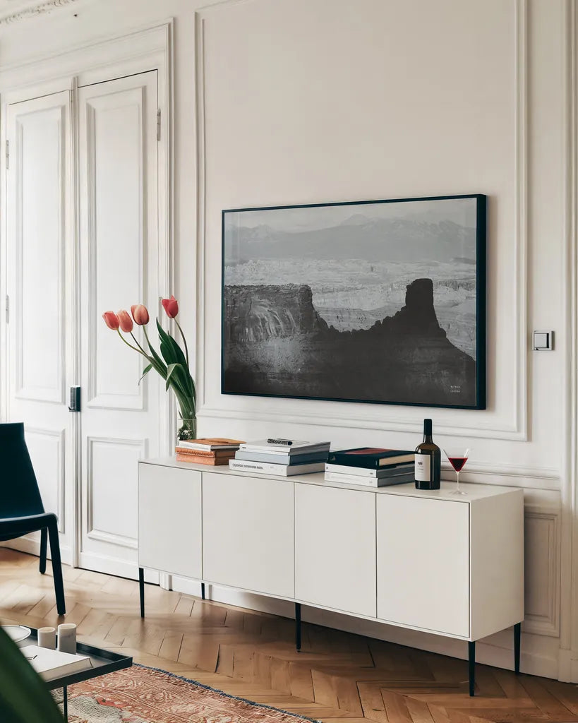 Southwest Sun BW by Nathan Larson. shown as a framed stretched canvas in a living room above a console. Available as a archival giclee rolled canvas, fine art paper, or poster print. SKU 80633i.