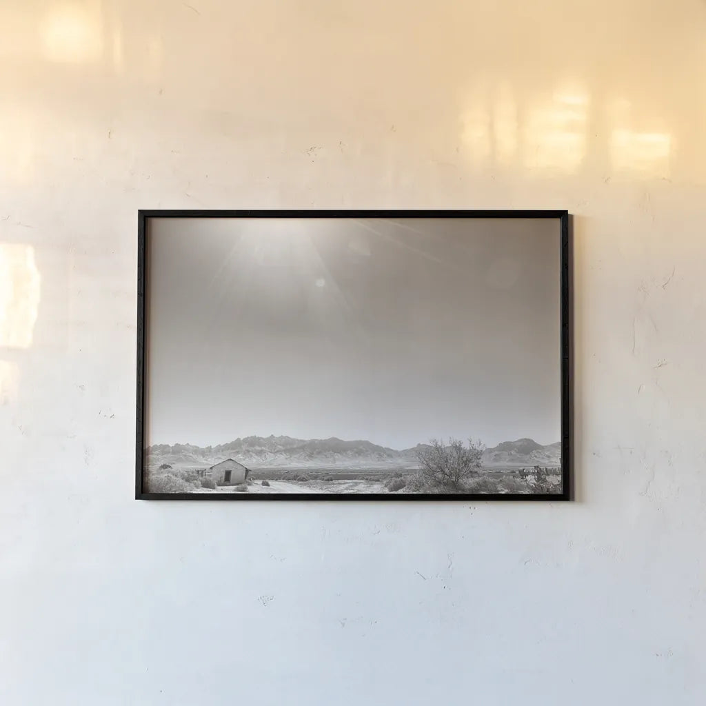 Southwestern Sun by Nathan Larson. shown as a paper print in a black flame. Available as a archival giclee rolled canvas, fine art paper, or poster print. SKU 82725i.