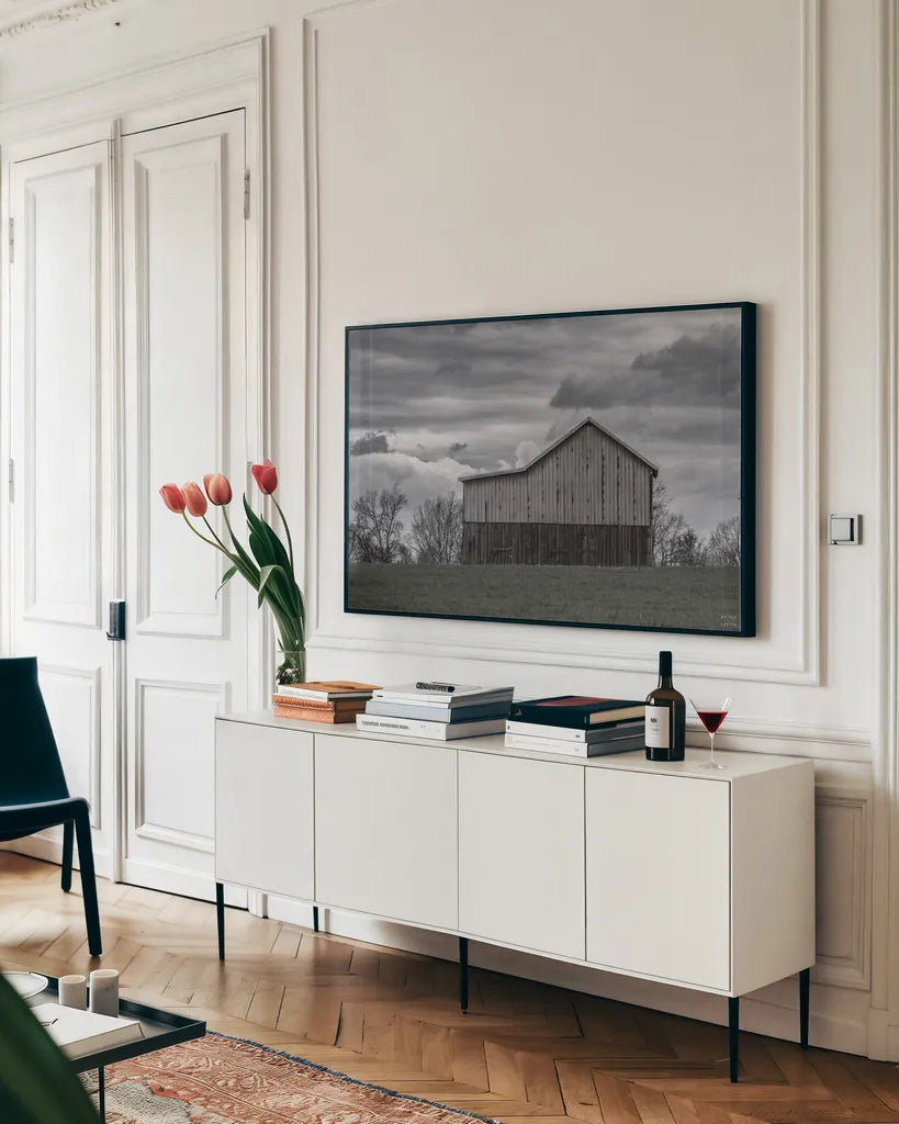 Spring Storms by Nathan Larson. shown as a framed stretched canvas in a living room above a console. Available as a archival giclee rolled canvas, fine art paper, or poster print. SKU 98030i.