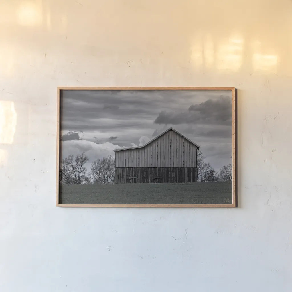 Spring Storms by Nathan Larson. shown as a paper print in a natural frame. Available as a archival giclee rolled canvas, fine art paper, or poster print. SKU 98030i.