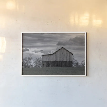 Spring Storms by Nathan Larson. shown as a paper print in a white frame. Available as a archival giclee rolled canvas, fine art paper, or poster print. SKU 98030i.