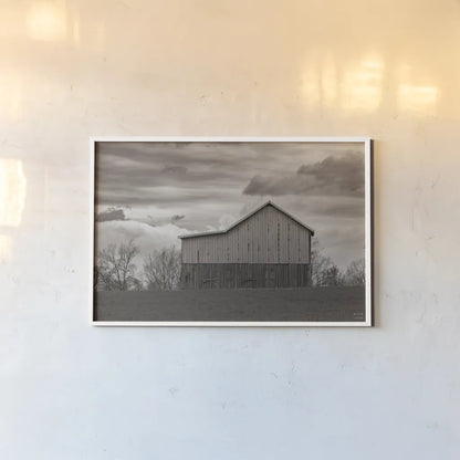 Spring Storms_sepia by Nathan Larson. shown as a paper print in a white frame. Available as a archival giclee rolled canvas, fine art paper, or poster print. SKU 98031i.