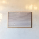 Storm Barn Bright by Nathan Larson. shown as a paper print in a natural frame. Available as a archival giclee rolled canvas, fine art paper, or poster print. SKU 80685i.