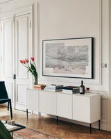 Storm Collage by Nathan Larson. shown as a framed stretched canvas in a living room above a console. Available as a archival giclee rolled canvas, fine art paper, or poster print. SKU 72701i.