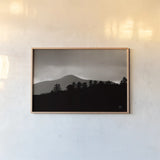 Storm Layers by Nathan Larson. shown as a paper print in a natural frame. Available as a archival giclee rolled canvas, fine art paper, or poster print. SKU 79108i.