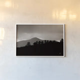 Storm Layers by Nathan Larson. shown as a paper print in a white frame. Available as a archival giclee rolled canvas, fine art paper, or poster print. SKU 79108i.