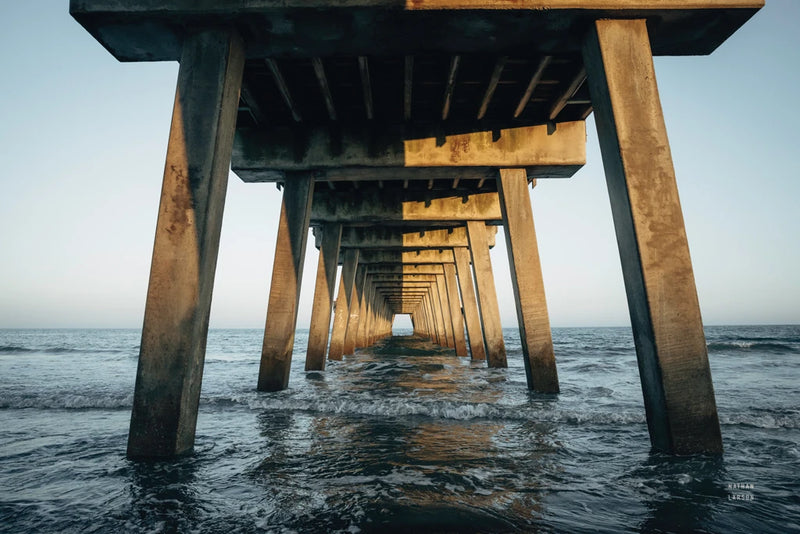 Sun Split Pier by Nathan Larson