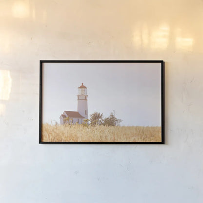 Sunny Day Lighthouse by Nathan Larson. shown as a paper print in a black flame. Available as a archival giclee rolled canvas, fine art paper, or poster print. SKU 90176i.