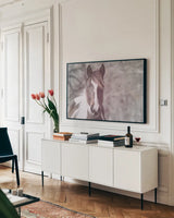 Sunny Field IV by Nathan Larson. shown as a framed stretched canvas in a living room above a console. Available as a archival giclee rolled canvas, fine art paper, or poster print. SKU 97359i.