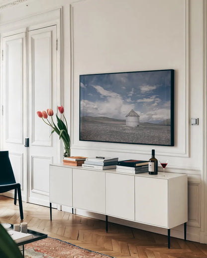 Sunny Pastures by Nathan Larson. shown as a framed stretched canvas in a living room above a console. Available as a archival giclee rolled canvas, fine art paper, or poster print. SKU 84241i.