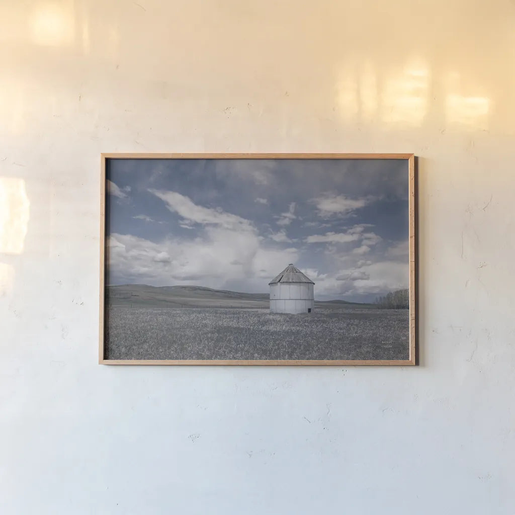 Sunny Pastures by Nathan Larson. shown as a paper print in a natural frame. Available as a archival giclee rolled canvas, fine art paper, or poster print. SKU 84241i.