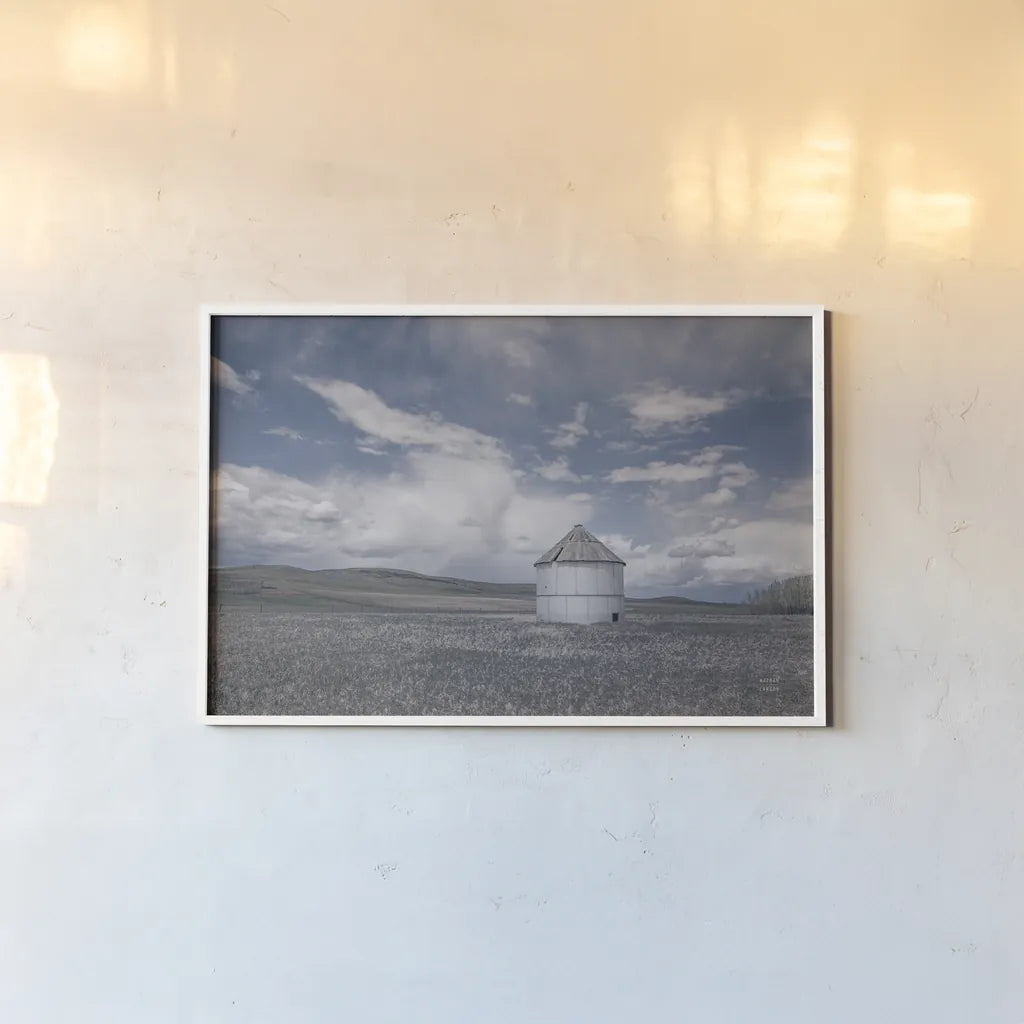 Sunny Pastures by Nathan Larson. shown as a paper print in a white frame. Available as a archival giclee rolled canvas, fine art paper, or poster print. SKU 84241i.