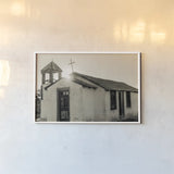 Sunset Cross by Nathan Larson. shown as a paper print in a white frame. Available as a archival giclee rolled canvas, fine art paper, or poster print. SKU 102619i.