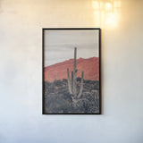 Sunsets and Saguaros I by Nathan Larson. shown as a paper print in a black flame. Available as a archival giclee rolled canvas, fine art paper, or poster print. SKU 76429h.