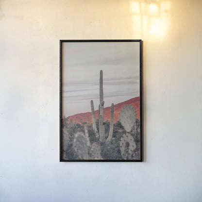 Sunsets and Saguaros II by Nathan Larson. shown as a paper print in a black flame. Available as a archival giclee rolled canvas, fine art paper, or poster print. SKU 76430h.