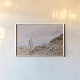 The Climb by Nathan Larson. shown as a paper print in a white frame. Available as a archival giclee rolled canvas, fine art paper, or poster print. SKU 90435i.
