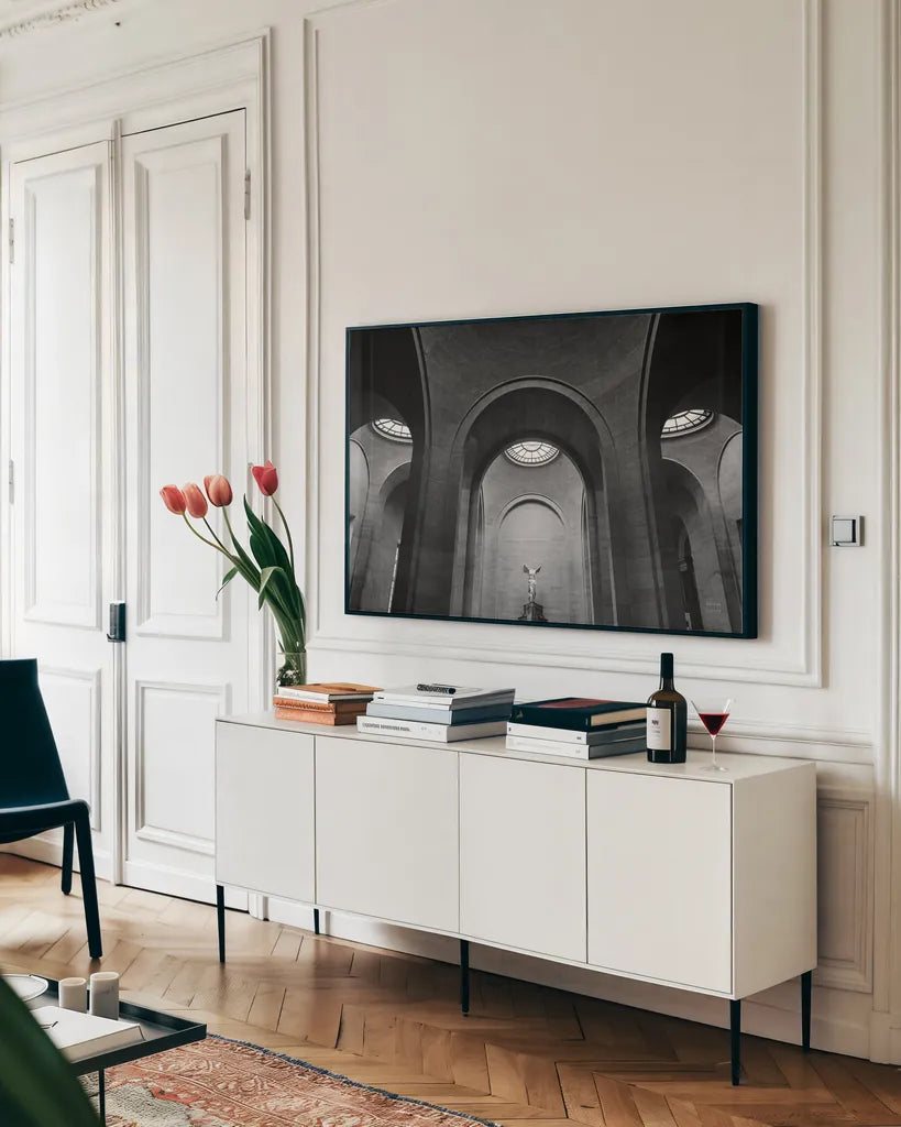 The Winged Victory of Samothrace by Nathan Larson. shown as a framed stretched canvas in a living room above a console. Available as a archival giclee rolled canvas, fine art paper, or poster print. SKU 81749i.