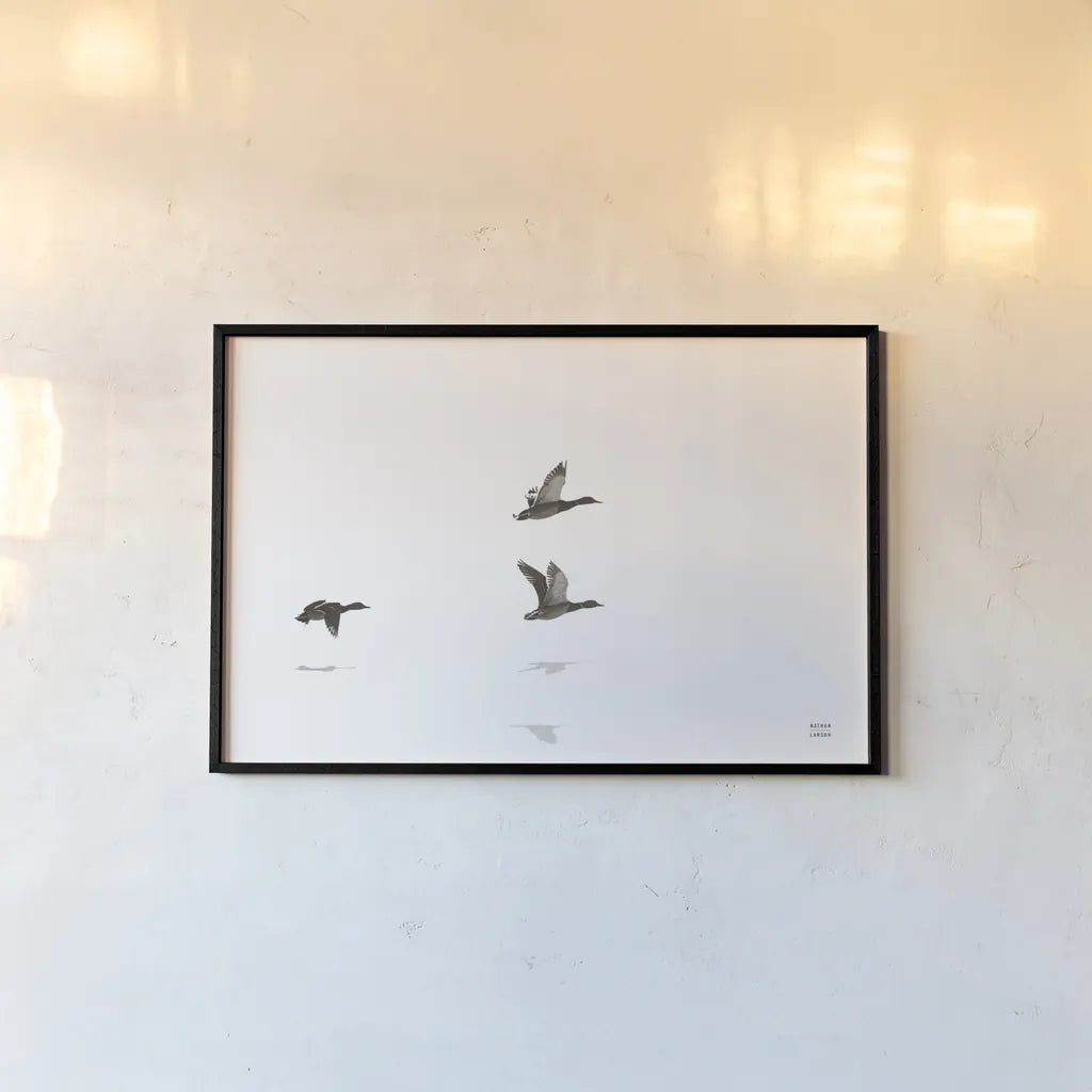 Three Departing by Nathan Larson. shown as a paper print in a black flame. Available as a archival giclee rolled canvas, fine art paper, or poster print. SKU 77894i.