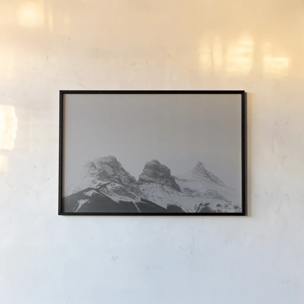 Three Sisters View by Nathan Larson. shown as a paper print in a black flame. Available as a archival giclee rolled canvas, fine art paper, or poster print. SKU 86712i.