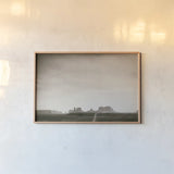 Timeless Monument Valley by Nathan Larson. shown as a paper print in a natural frame. Available as a archival giclee rolled canvas, fine art paper, or poster print. SKU 87106i.