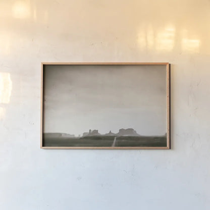 Timeless Monument Valley by Nathan Larson. shown as a paper print in a natural frame. Available as a archival giclee rolled canvas, fine art paper, or poster print. SKU 87106i.